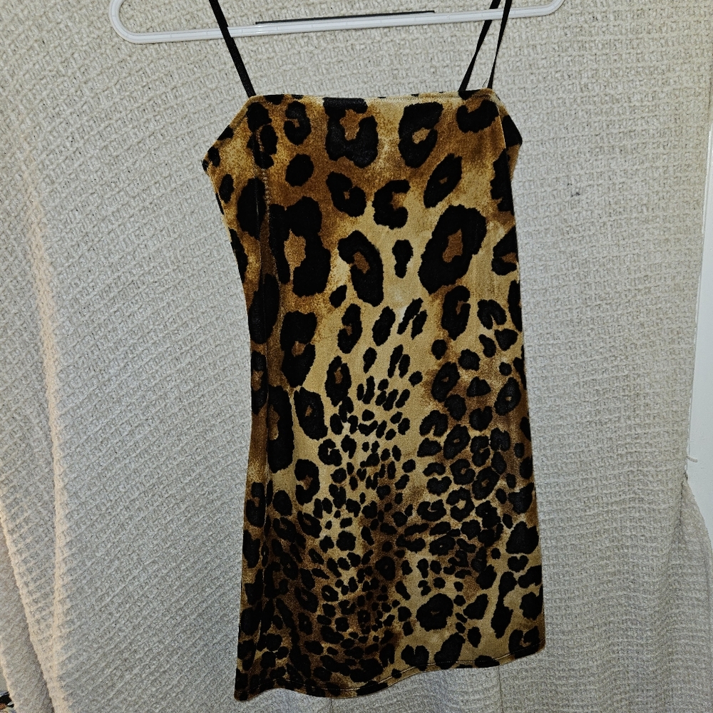 Leppard print mini dress with adjustable straps.